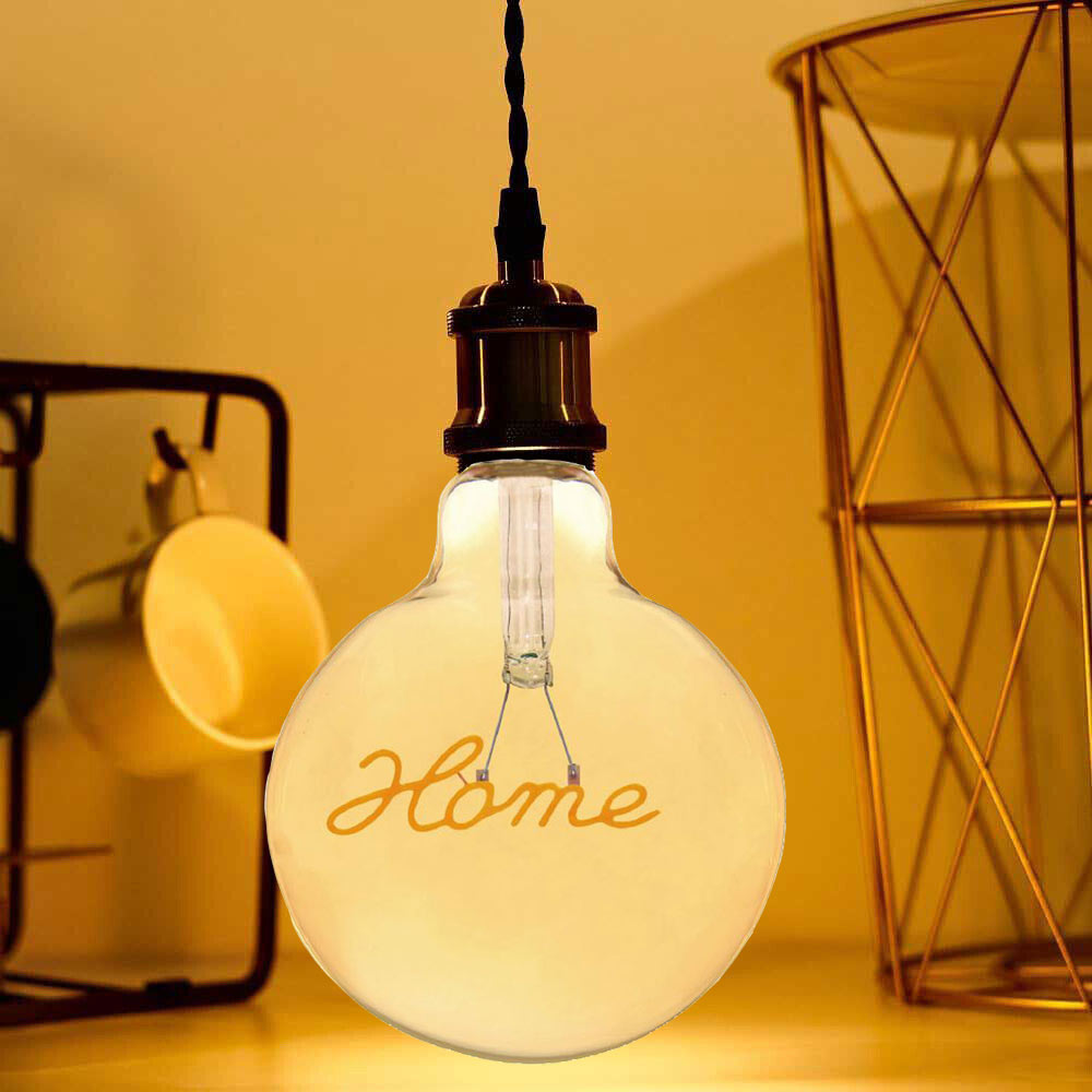 Lampadina ambrata con led a filamento che crea la scritta HOME 4 watt E27 lampada decorativa stile vintage luce calda 2500k
