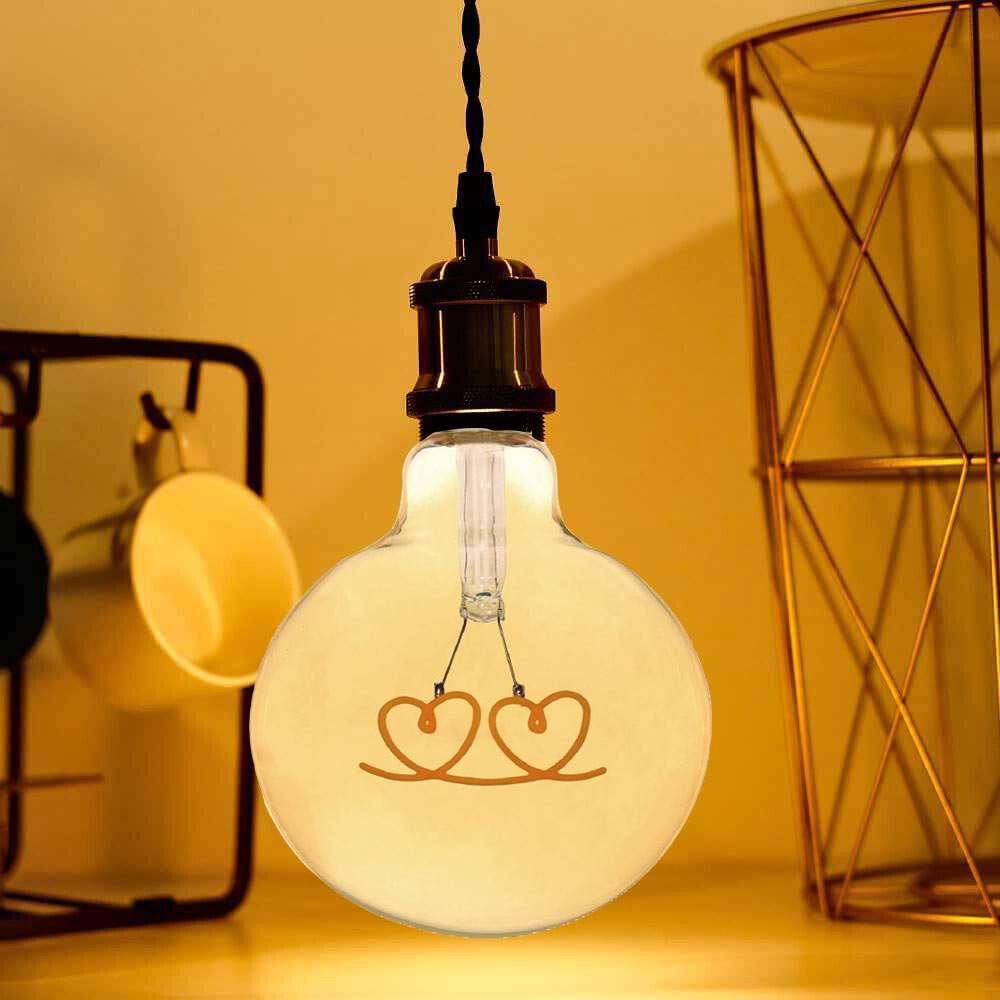 Lampadina ambrata con led a filamento che crea due cuori 4 watt E27 lampada decorativa stile vintage luce calda 2500k