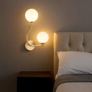 Applique da parete bronzo due sfere opache e dettaglio foglia 2XG9