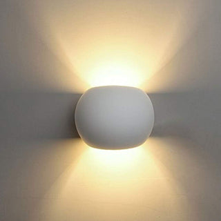 Applique da parete in gesso tondo a doppia emissione di luce attacco G9