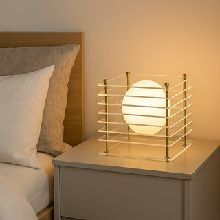 Lampada lume con sfera opalina e struttura trasparente finitura oro G9