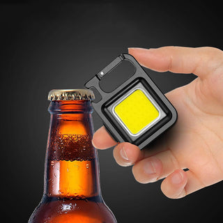 Torcia led 3IN1 3 modalità di luce portachiavi calamitata apribottiglia