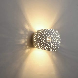 Applique a parete in gesso traforato tondo doppia emissione di luce G9