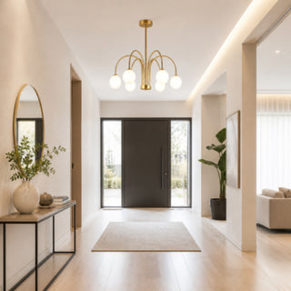 Lampadario moderno oro con 6 bracci curvi 6 sfere bianche attacco G9