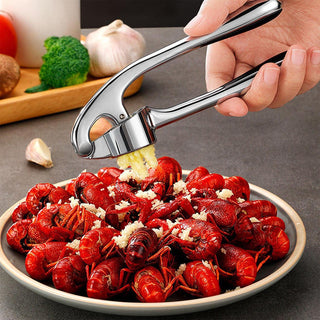 Spremi aglio schiacchiaglio in acciaio con snocciola olive ciliegie